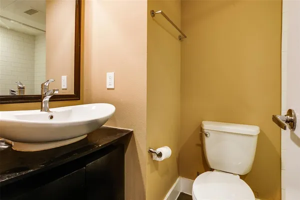 a bathroom with a sink and a toilet