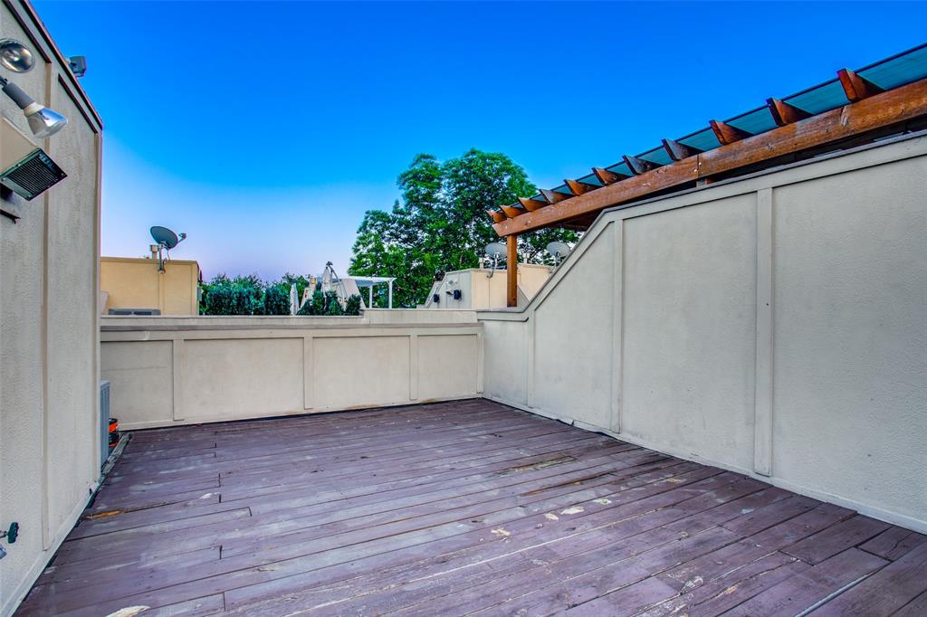 4618 Cedar Springs Road, Unit D Dallas, TX 75219 - Photo 28 of 29 a view of a balcony with an outdoor space