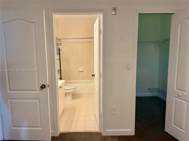 a view of bathroom with a glass door