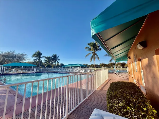 a view of a roof deck with lake view