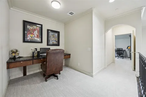 a view of a workspace with furniture