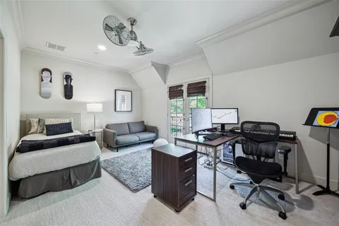 a view of a livingroom with workspace and a couch