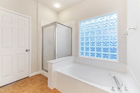 an empty room with a bathroom