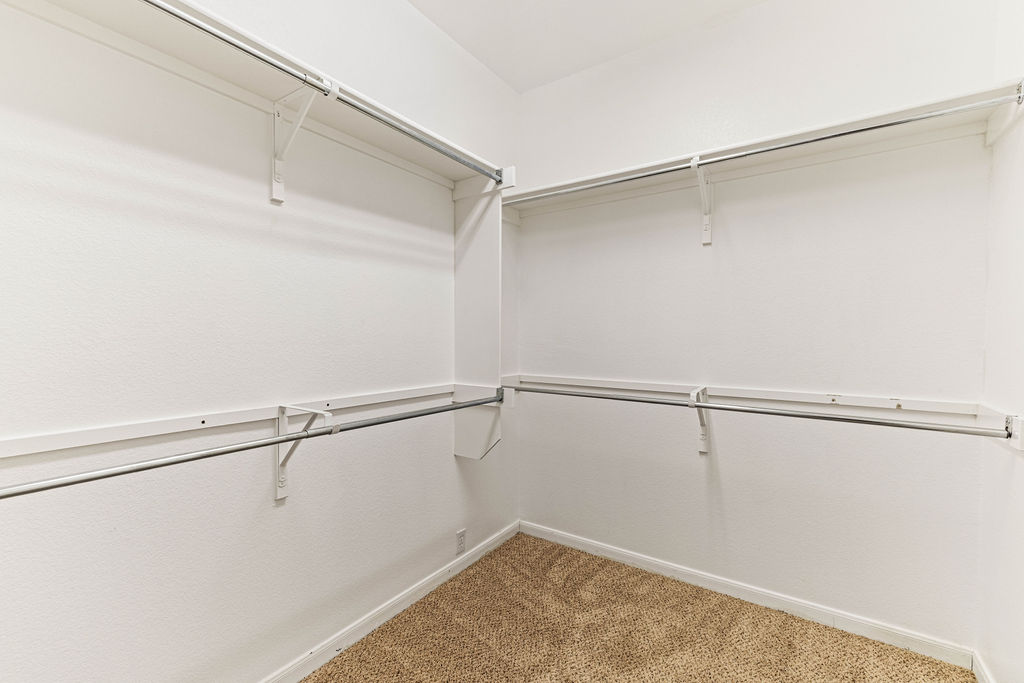 2134 Paradise Ridge Drive Round Rock, TX 78665 - Photo 17 of 28 a view of a room with racks on the wall