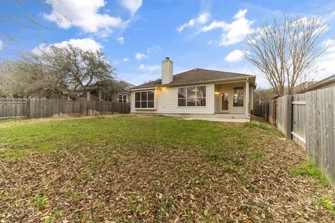 a bathroom with a sink mirror toilet and bathtub