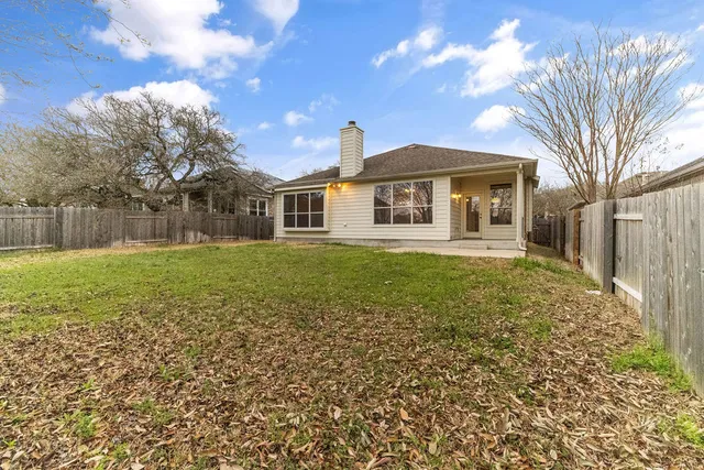 a bathroom with a sink mirror toilet and bathtub