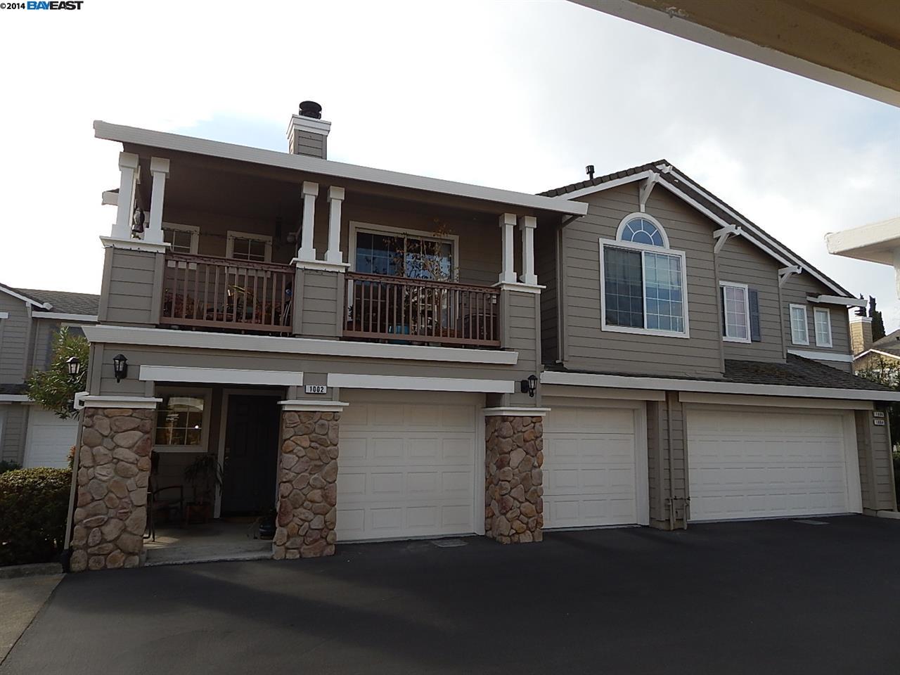 1002 Radiant Lane, Unit 80 San Ramon, CA 94583 - Photo 1 of 1 a front view of a house with a garage