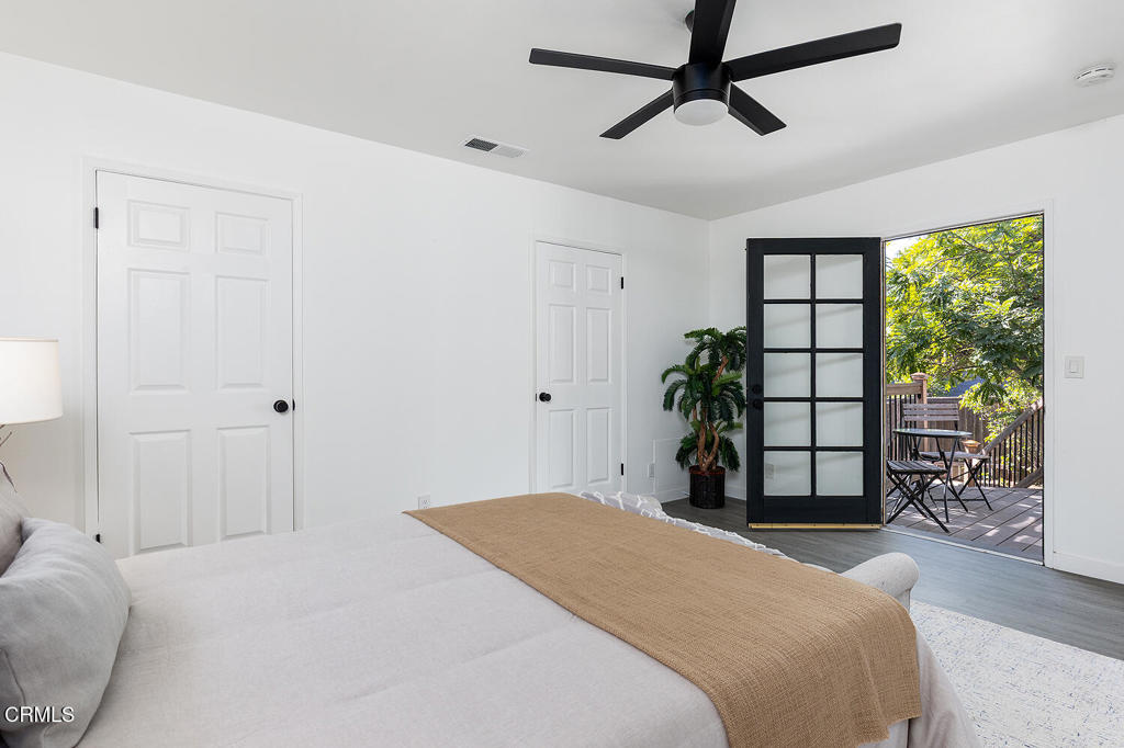 1202 East Lexington Street Pasadena, CA 91104 - Photo 14 of 39 a bedroom with a bed and a large window