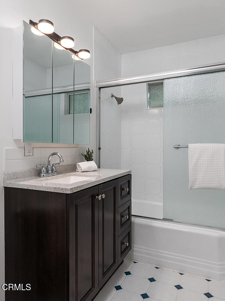 1202 East Lexington Street Pasadena, CA 91104 - Photo 20 of 39 a bathroom with a sink and a mirror