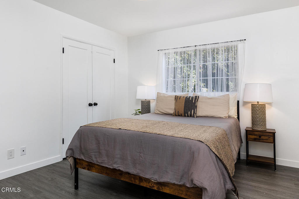 1202 East Lexington Street Pasadena, CA 91104 - Photo 21 of 39 a bedroom with a bed and a window