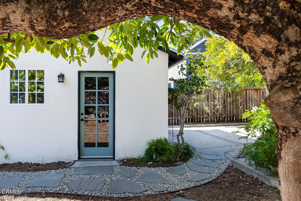 1202 East Lexington Street Pasadena, CA 91104 - Photo 24 of 39 a front view of a house with a yard