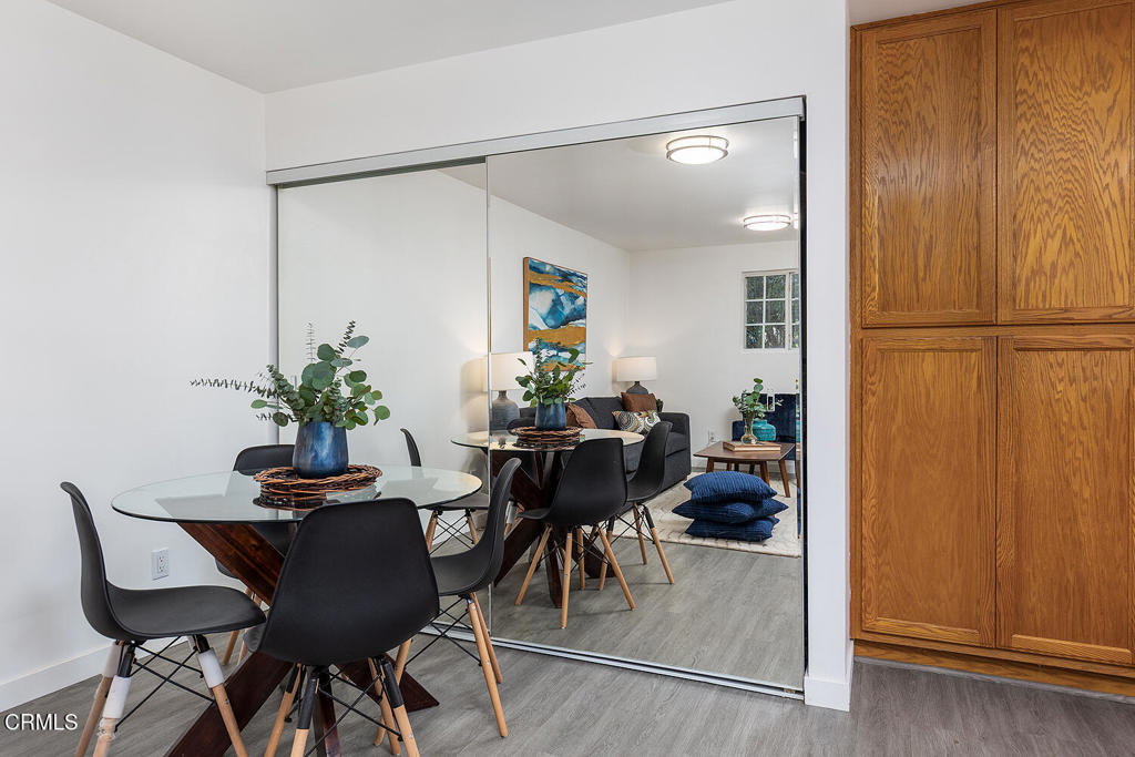1202 East Lexington Street Pasadena, CA 91104 - Photo 29 of 39 a view of a dining room with furniture and a potted plant