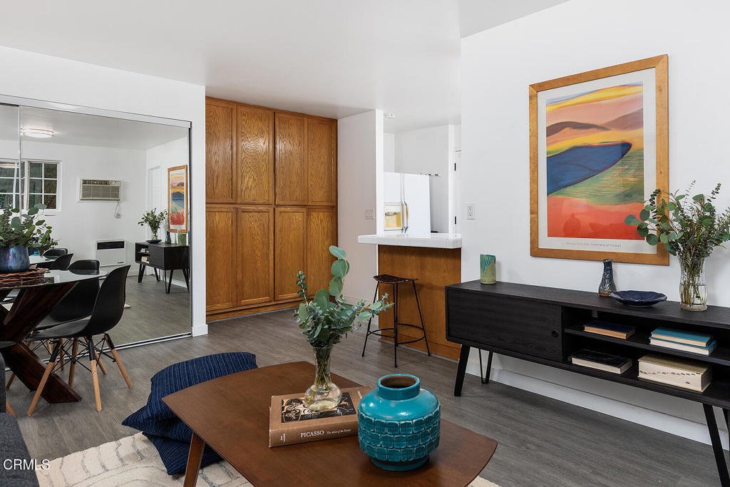 1202 East Lexington Street Pasadena, CA 91104 - Photo 30 of 39 a living room with furniture potted plant and a window