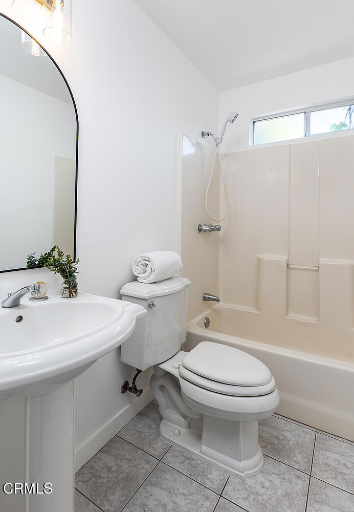 1202 East Lexington Street Pasadena, CA 91104 - Photo 32 of 39 a bathroom with a sink toilet and shower