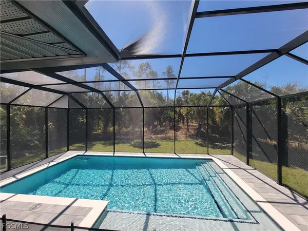 a view of yard with wooden floor