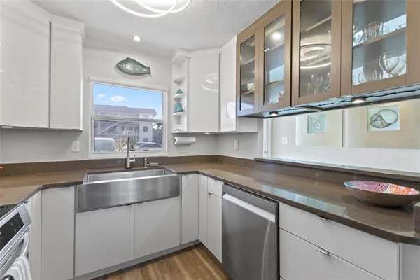 a view of a hallway view with wooden floor and staircase