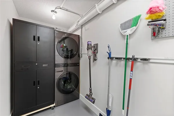 a bedroom with a bed and a mirror