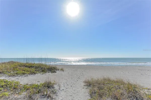 a view of beach and ocean