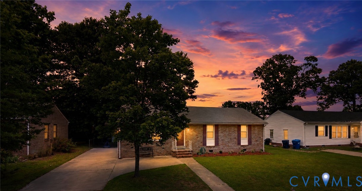 912 Williamsburg Road Colonial Heights, VA 23834 - Photo 1 of 1 Brick-front residence featuring a classic facade w