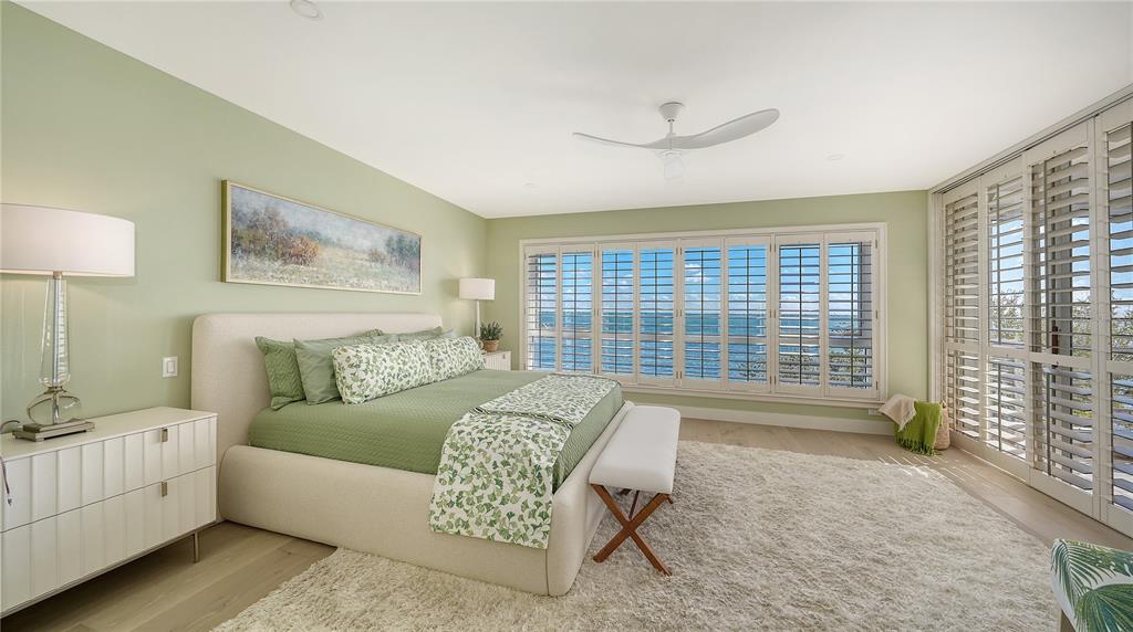 2410 Harbourside Drive, Unit 142 Longboat Key, FL 34228 - Photo 25 of 55 a living room with furniture and a large window