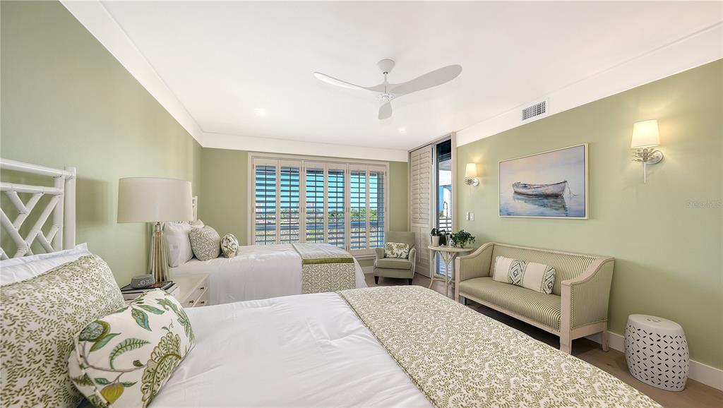 2410 Harbourside Drive, Unit 142 Longboat Key, FL 34228 - Photo 33 of 55 a living room with furniture and a large window