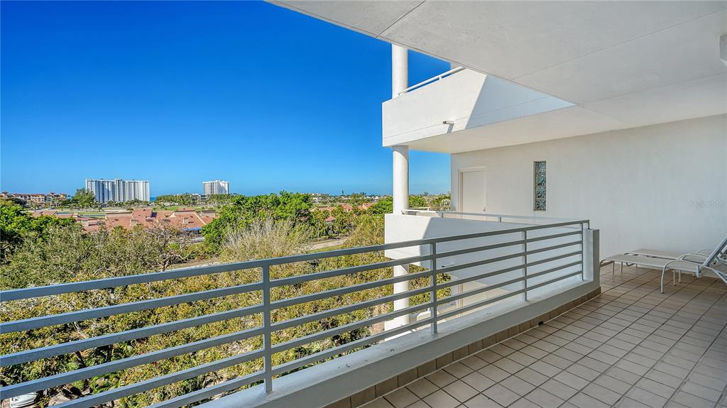2410 Harbourside Drive, Unit 142 Longboat Key, FL 34228 - Photo 35 of 55 a view of a building from a balcony