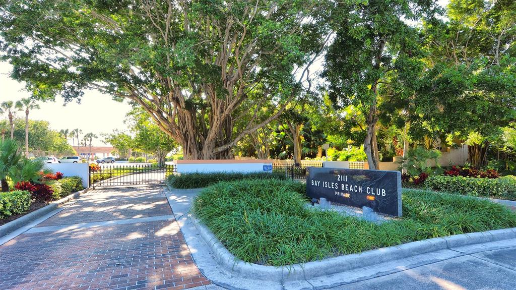 2410 Harbourside Drive, Unit 142 Longboat Key, FL 34228 - Photo 50 of 55 a view of a sitting area with trees in the background