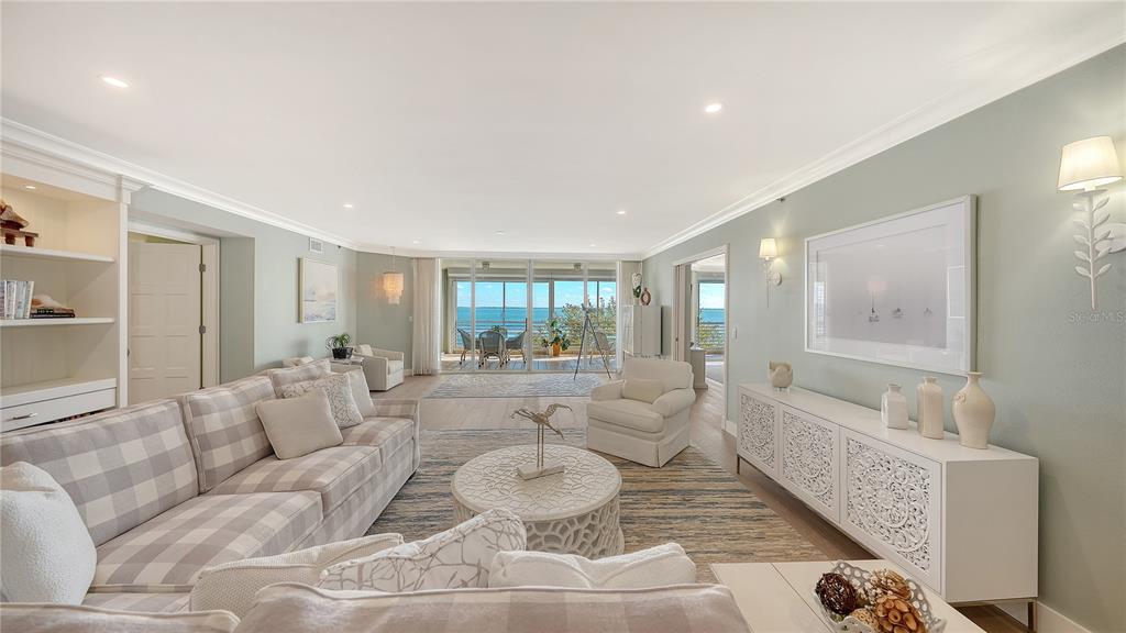 2410 Harbourside Drive, Unit 142 Longboat Key, FL 34228 - Photo 5 of 55 a living room with furniture and a large window