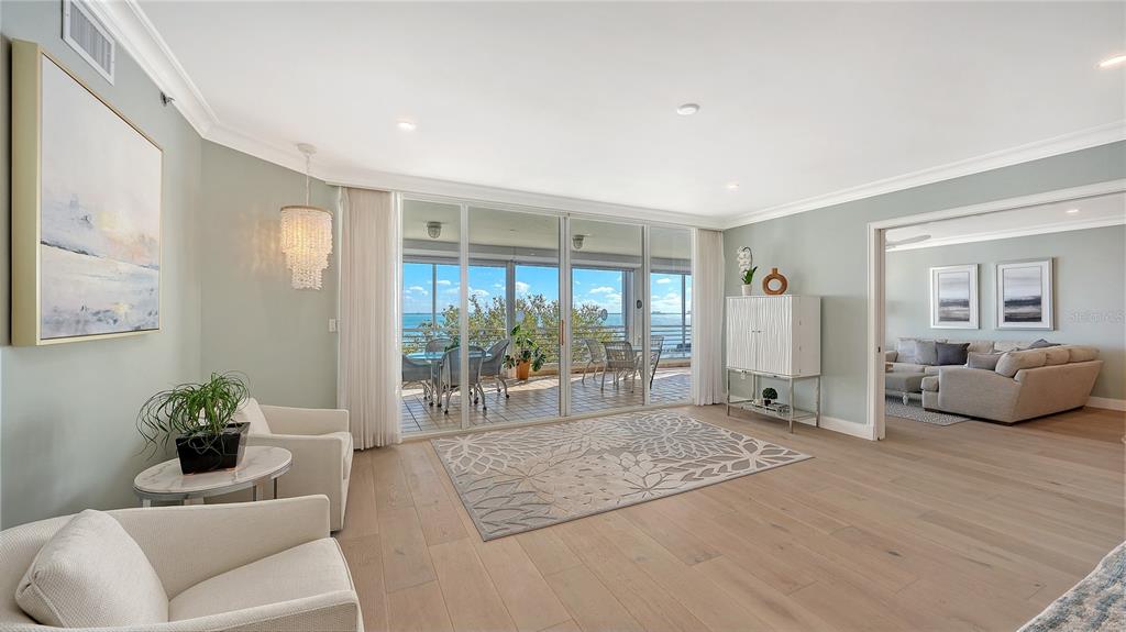 2410 Harbourside Drive, Unit 142 Longboat Key, FL 34228 - Photo 10 of 55 a living room with furniture and a couch