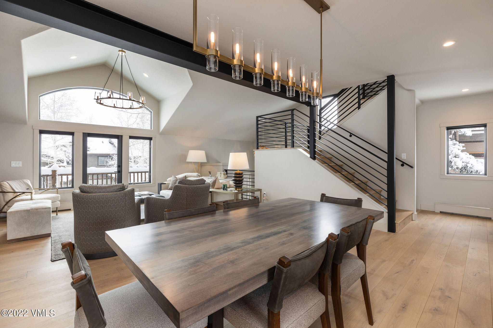 92 Knudson Ranch Road Edwards, CO 81632 - Photo 1 of 21 a view of a dining room with furniture window and wooden floor