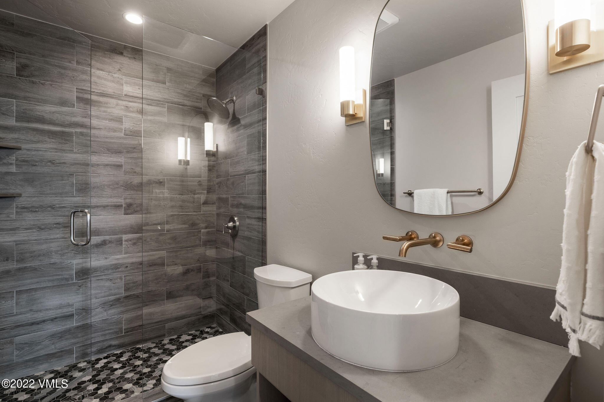 92 Knudson Ranch Road Edwards, CO 81632 - Photo 12 of 21 a bathroom with a sink a toilet and shower