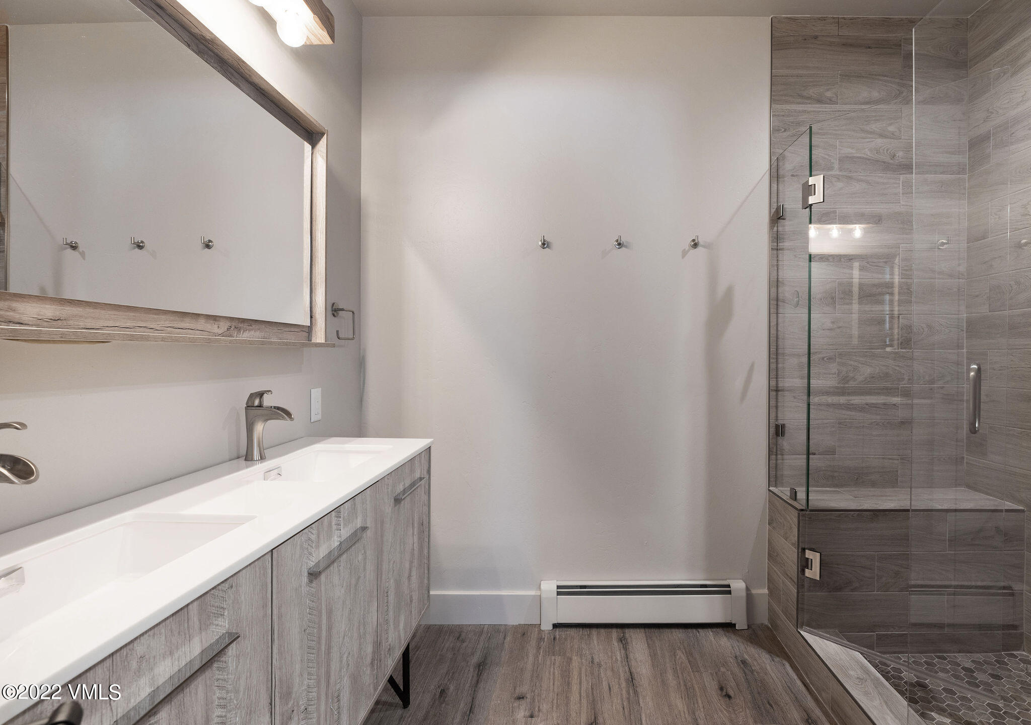 92 Knudson Ranch Road Edwards, CO 81632 - Photo 20 of 21 a bathroom with a sink and a mirror