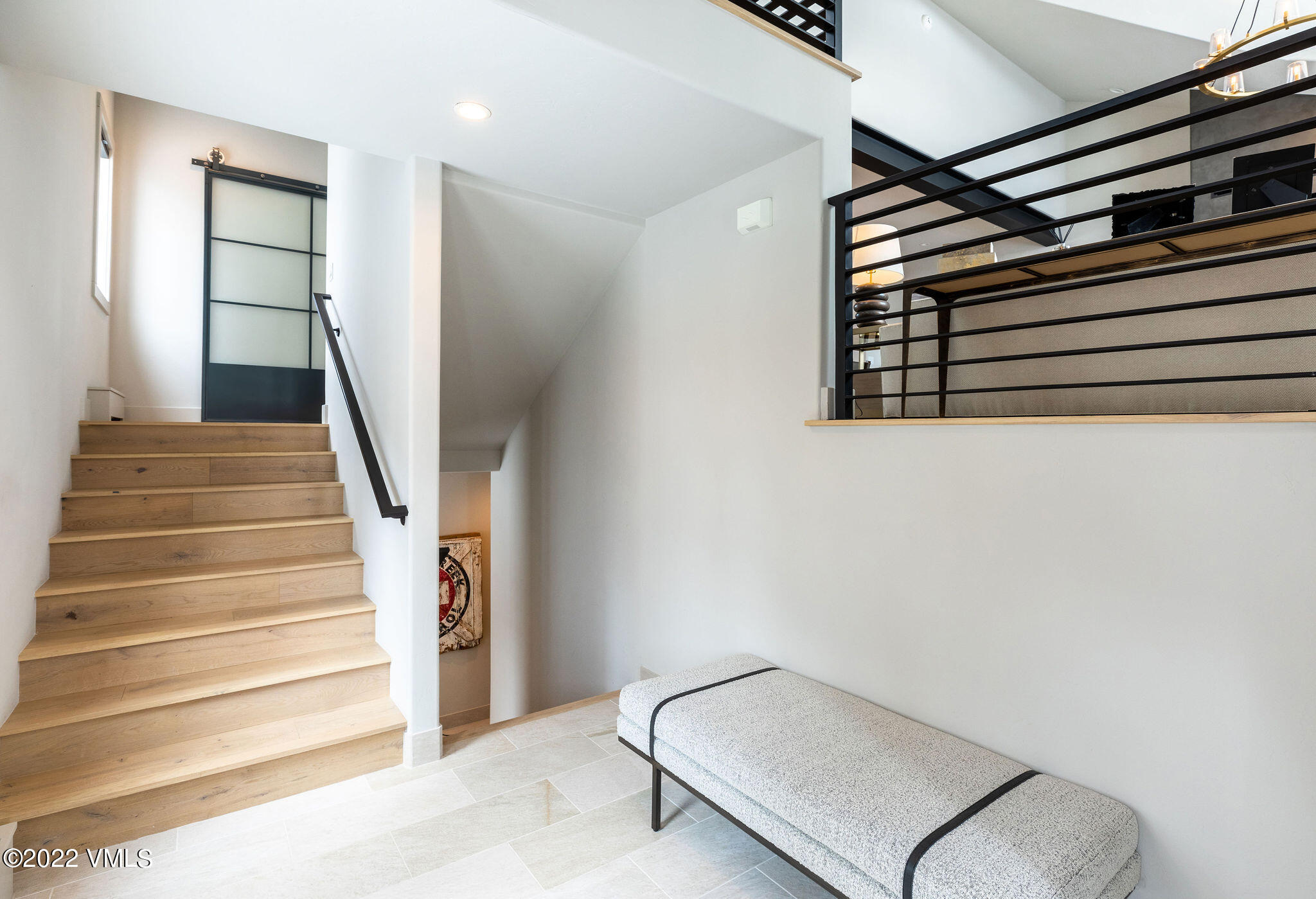 92 Knudson Ranch Road Edwards, CO 81632 - Photo 2 of 21 a view of staircase with white walls and a window