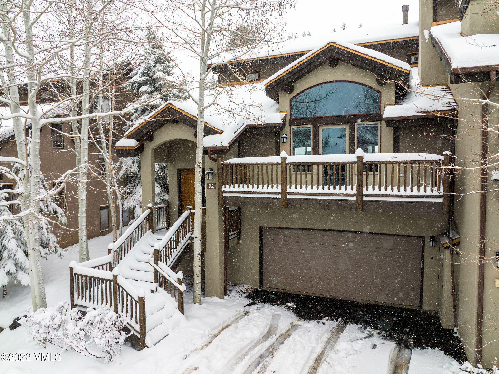92 Knudson Ranch Road Edwards, CO 81632 - Photo 21 of 21 a front view of a house with a yard