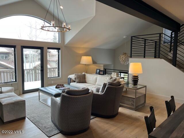 92 Knudson Ranch Road Edwards, CO 81632 - Photo 6 of 21 a living room with furniture chandelier and a chandelier