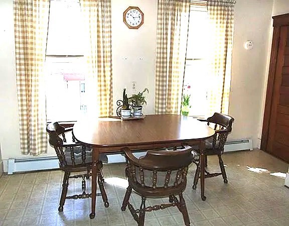 56 Plantation Street Worcester, MA 01604 - Photo 16 of 18 a view of a dining room with furniture and wooden floor