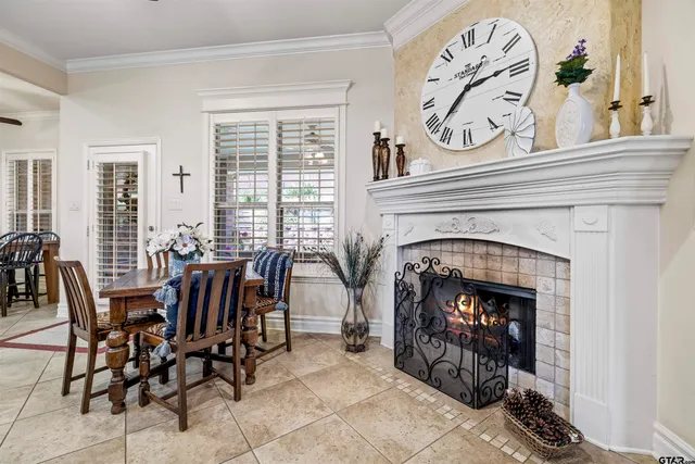a view of a livingroom with furniture and a fireplace