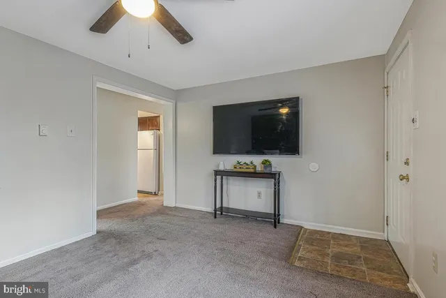a view of a livingroom with a flat screen tv