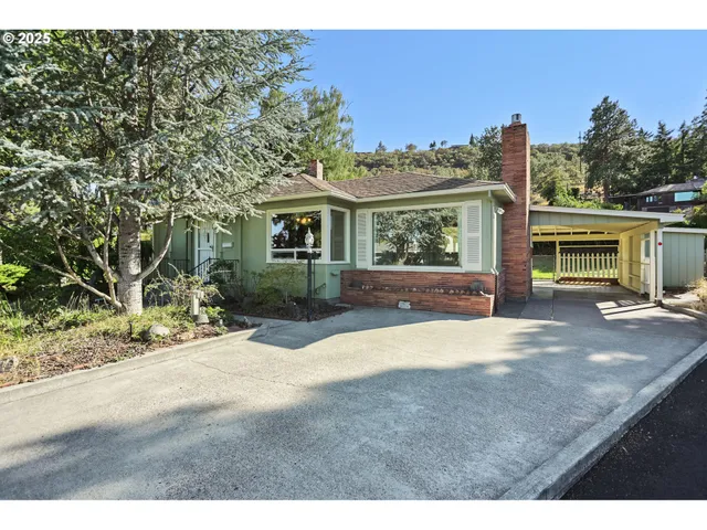 a view of outdoor space yard and front view of a house
