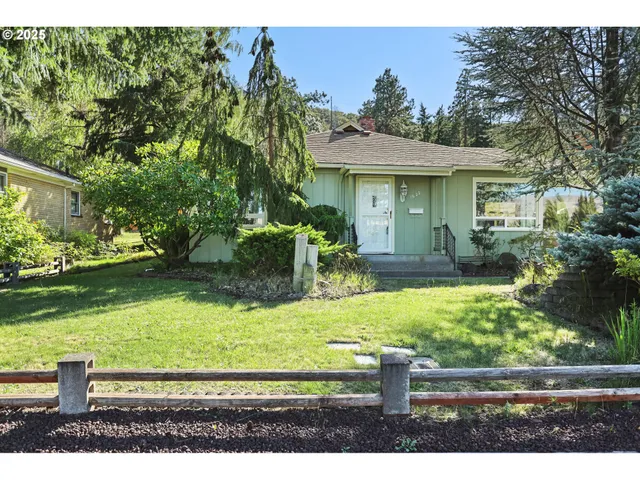 a house view with a garden space