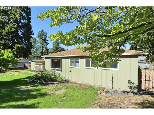 a house view with a garden space