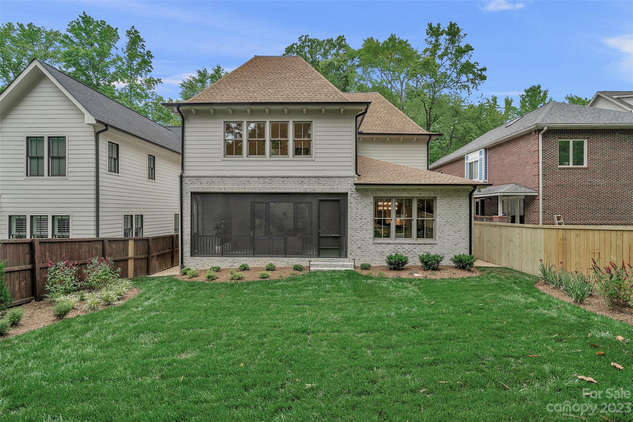 728 Ellsworth Road Charlotte, NC 28211 - Photo 40 of 43 a front view of a house with a yard and porch