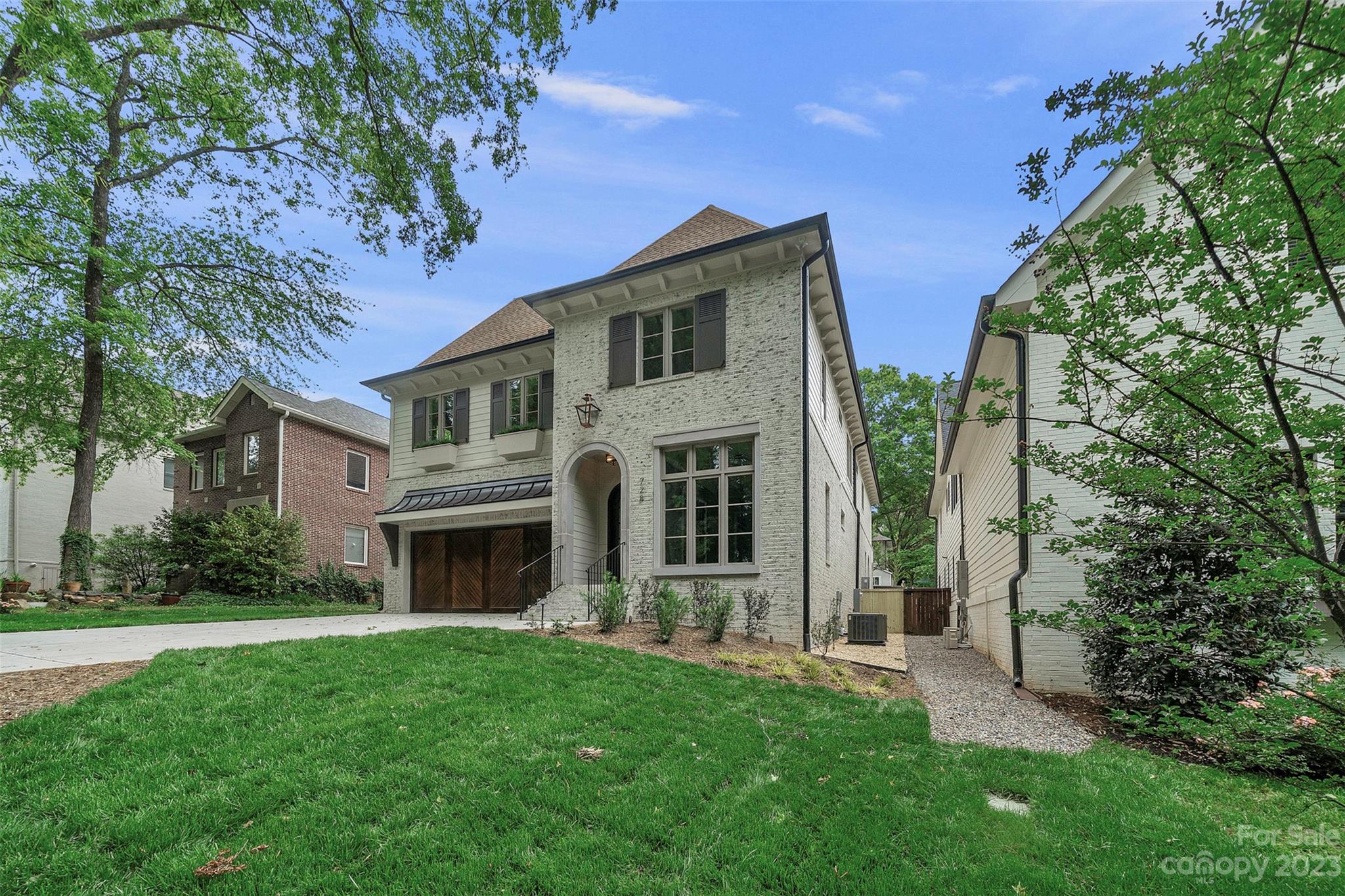 728 Ellsworth Road Charlotte, NC 28211 - Photo 43 of 43 a front view of a house with garden