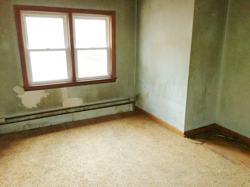 62 Parham Road Tyngsborough, MA 01879 - Photo 7 of 11 a view of a room with window
