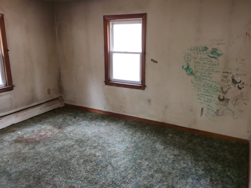 62 Parham Road Tyngsborough, MA 01879 - Photo 8 of 11 an empty room with a window