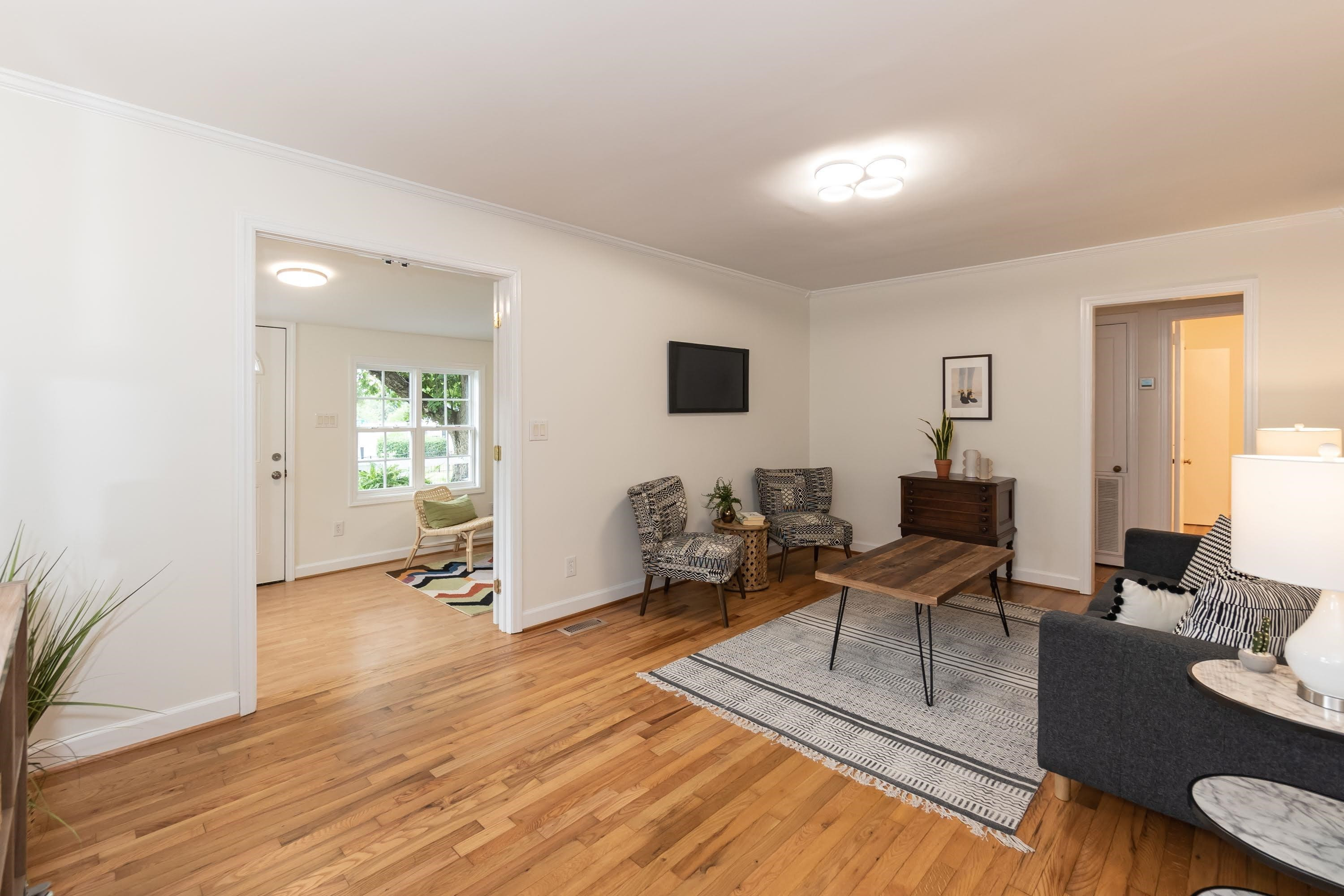 1720 Bennett Street Raleigh, NC 27604 - Photo 11 of 49 Living Room Looking Towards Sun Room
