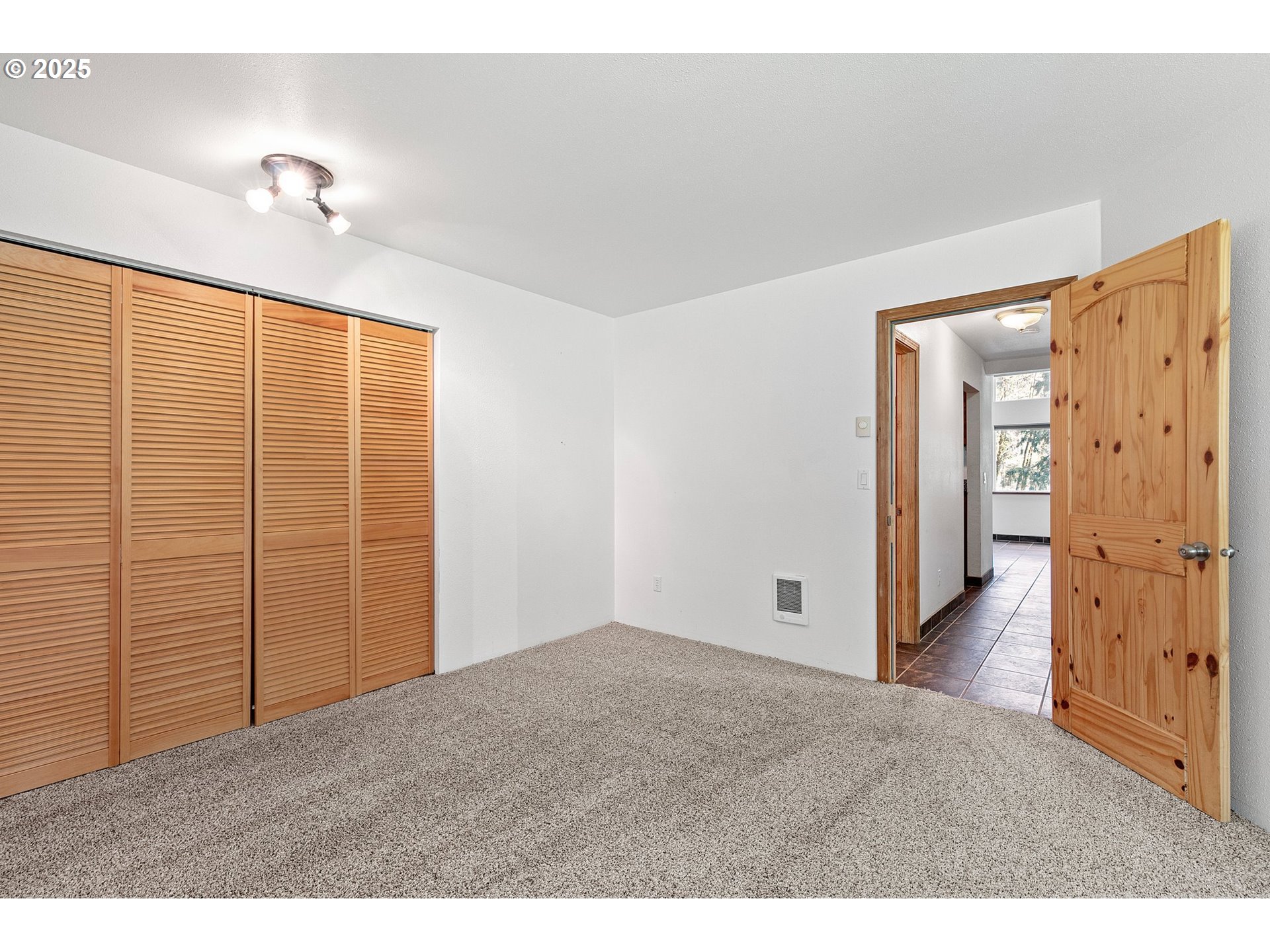 24458 Panther Creek Road Veneta, OR 97487 - Photo 25 of 46 a view of an empty room