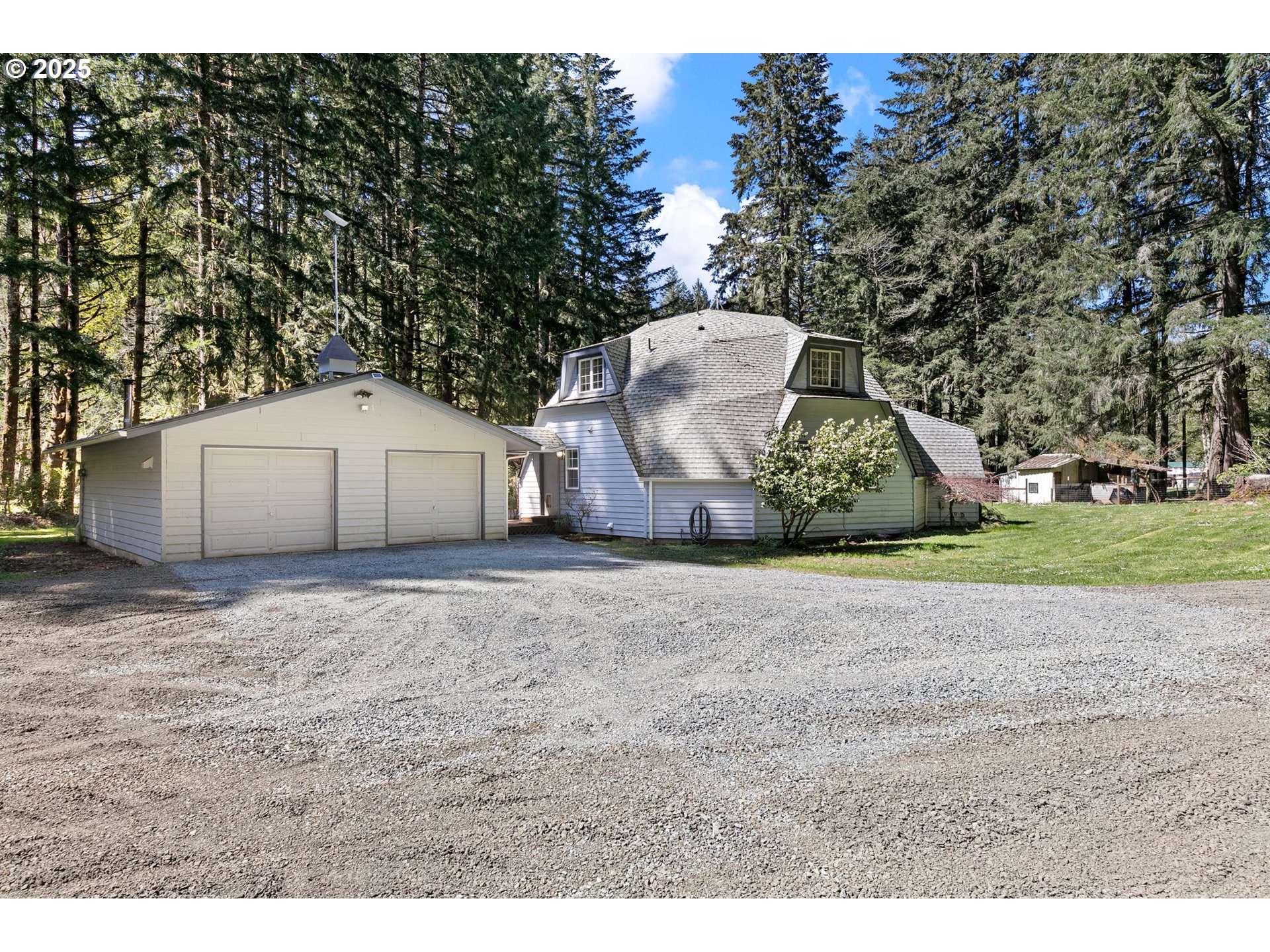 24458 Panther Creek Road Veneta, OR 97487 - Photo 3 of 46 a backyard of a house with lots of green space