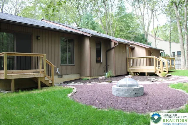 a house view with a backyard space