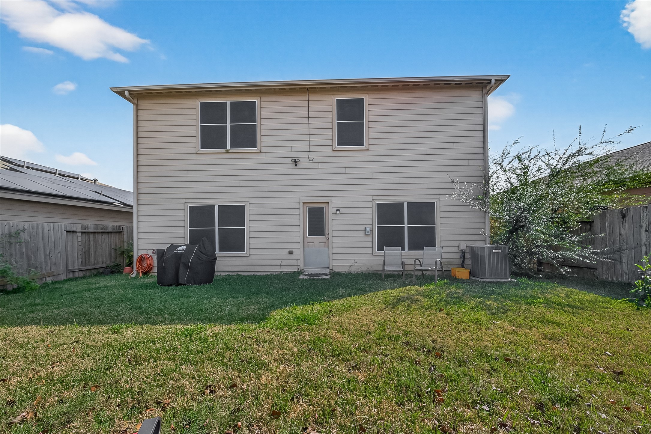 1019 Arnica Street Baytown, TX 77521 - Photo 15 of 16 a front view of a house with a yard